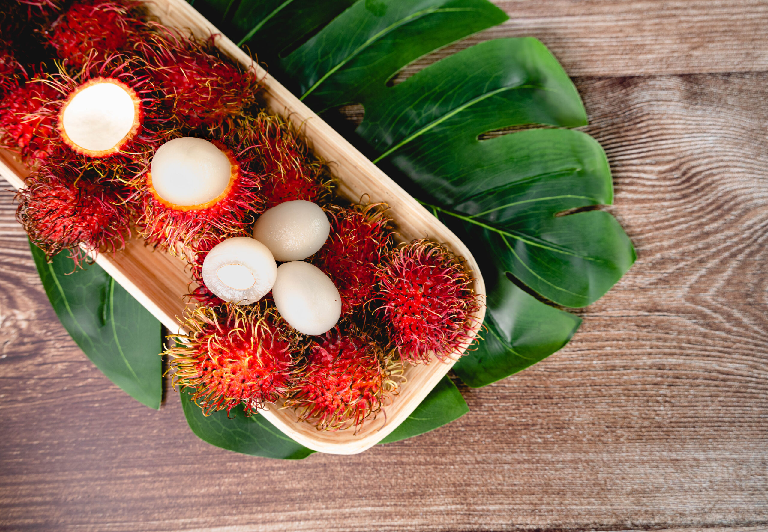 HLB RAMBUTAN ON TRAY OVER LEAF_WOODEN BCK-1